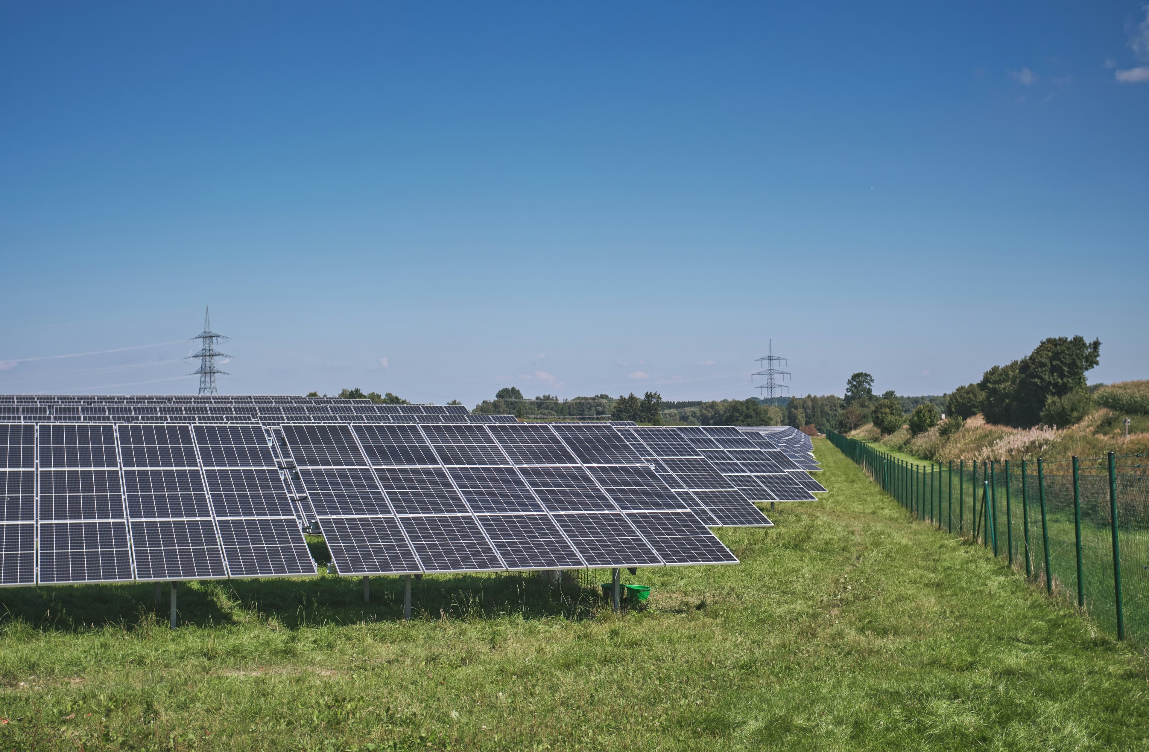 Solar panel field under an open sky