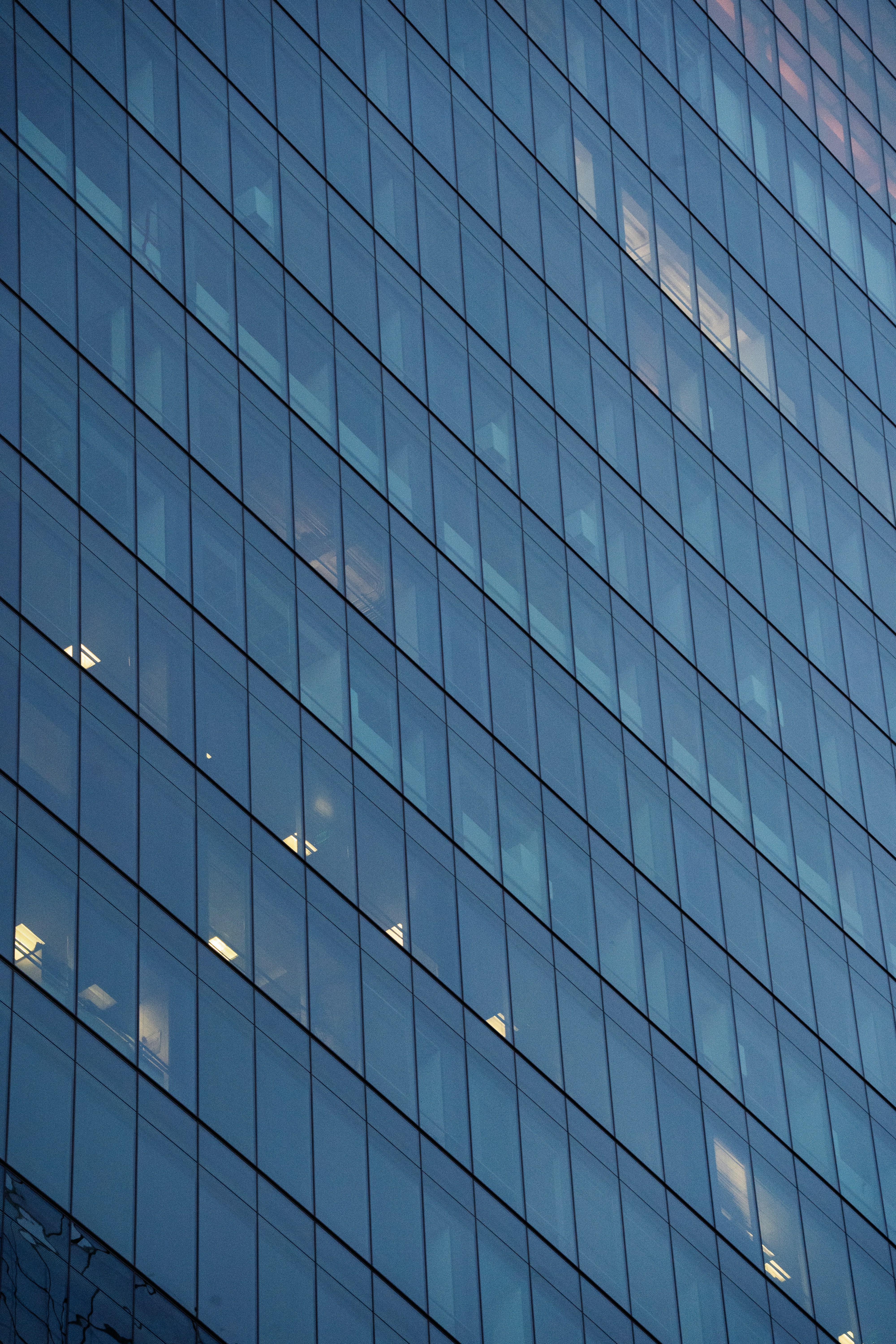 Glass facade of a modern commercial building